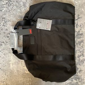 Tumi black travel satchel